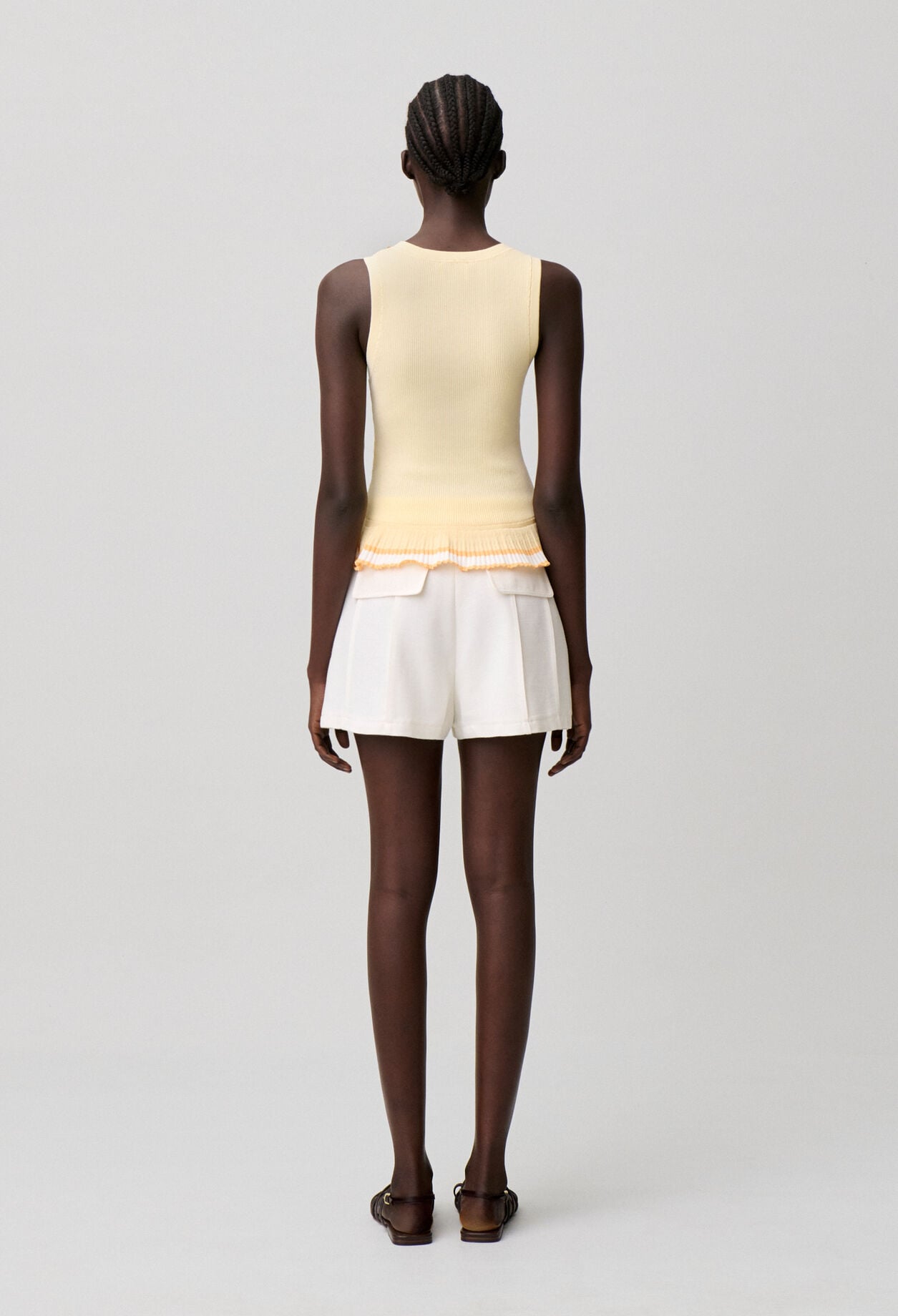 Top de punto cuello redondo flores
