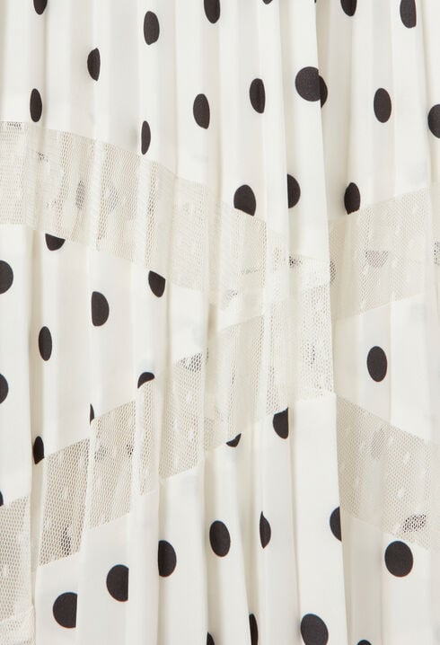 Falda plisada de lunares