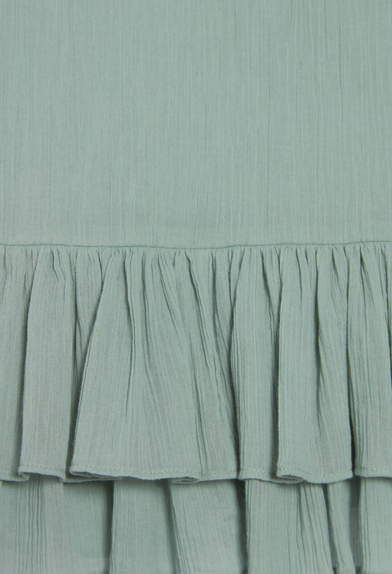 Top corto con volantes