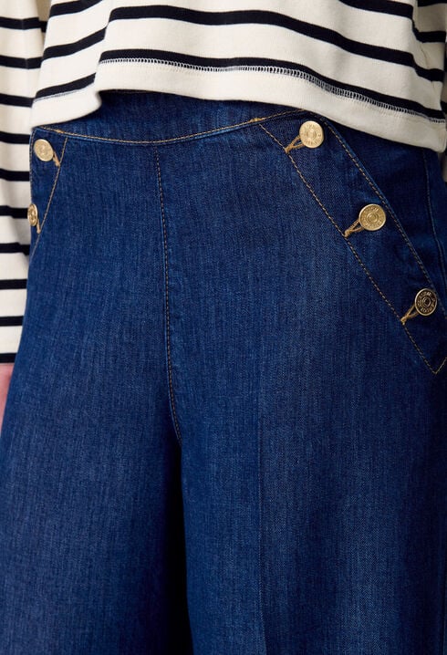 Pantalón vaquero ancho con botones