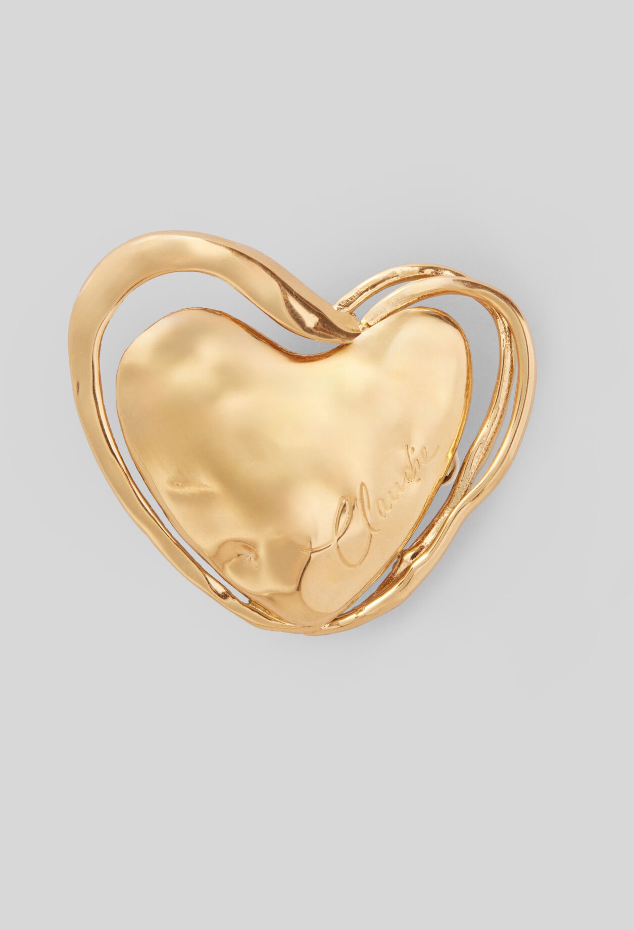 Broche dorada forma de corazón