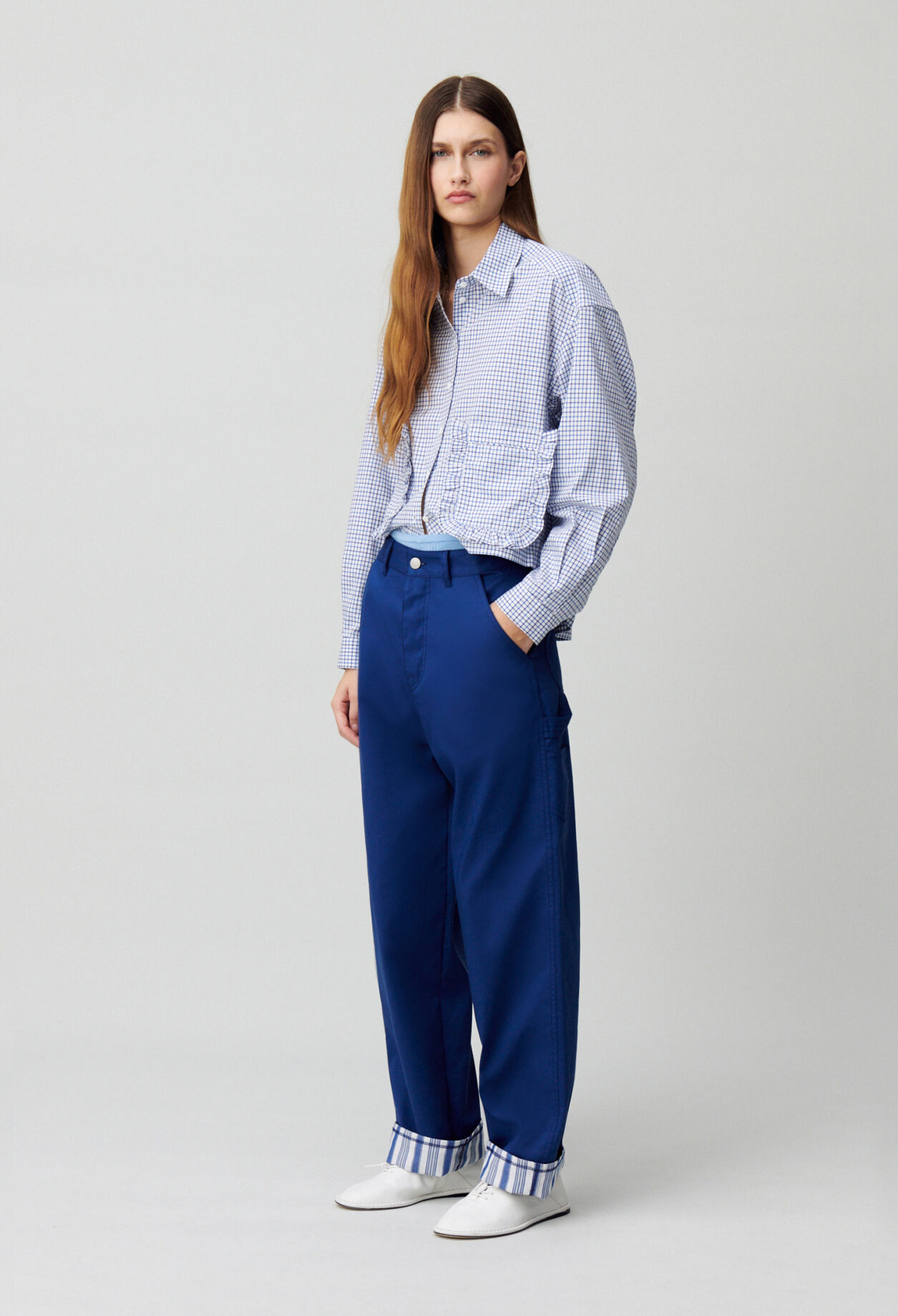 Pantalón con dobladillos a rayas