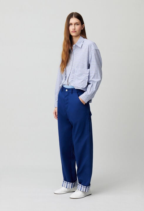 Pantalón con dobladillos a rayas