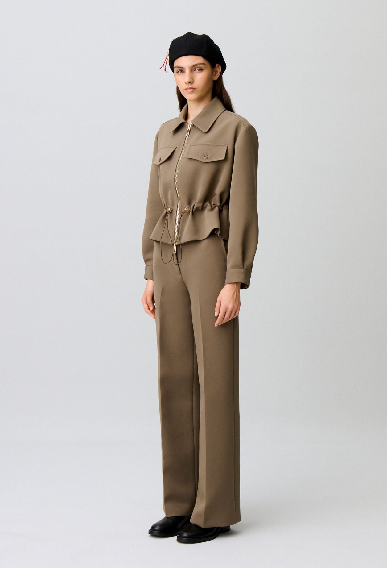 Chaqueta peplum flor dorada
