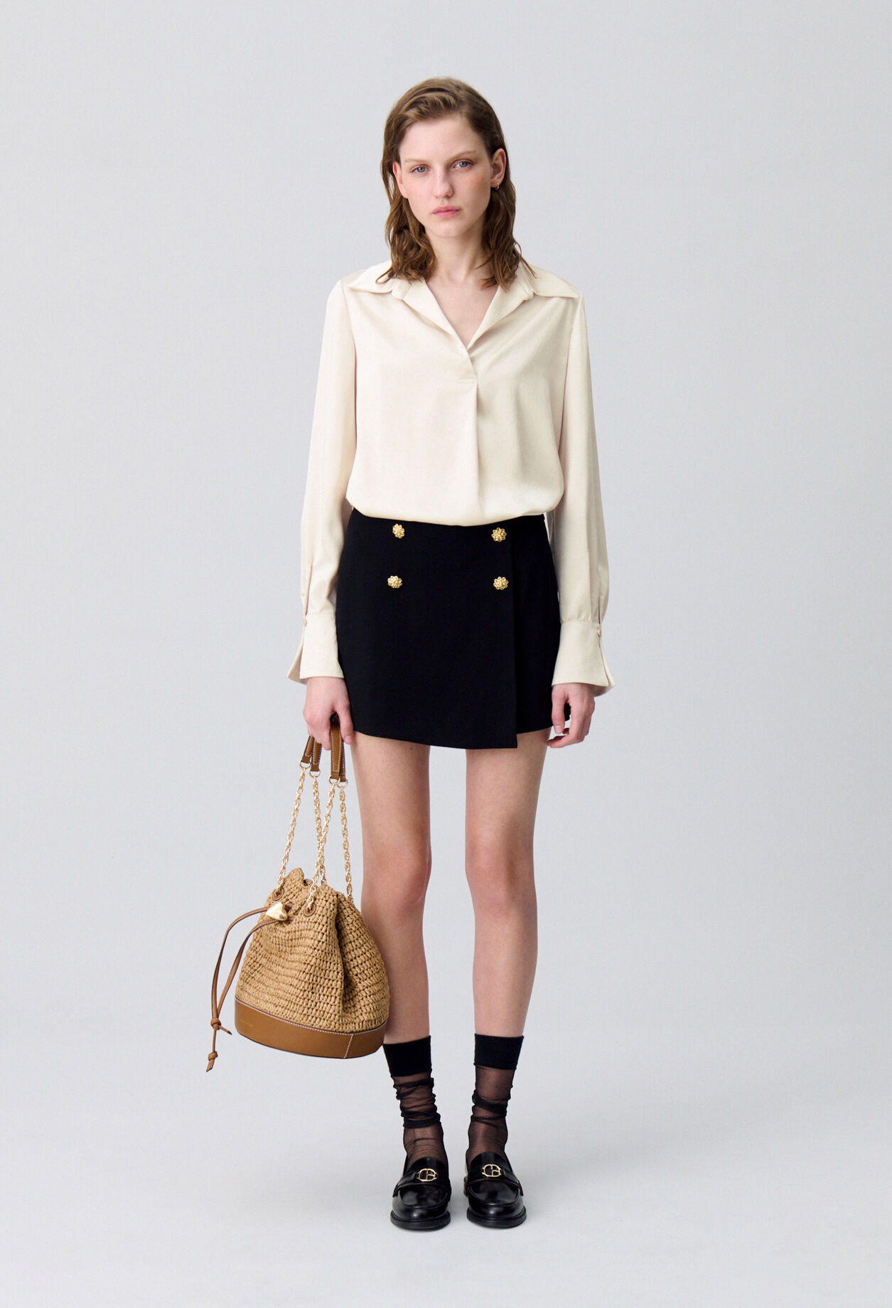 Blusa fluida plisada