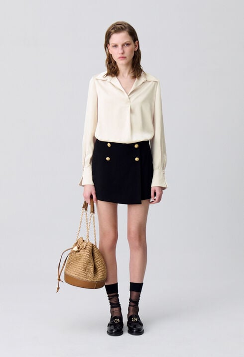Blusa fluida plisada