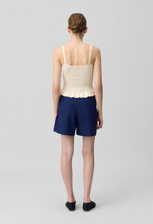 Top satinado con volantes