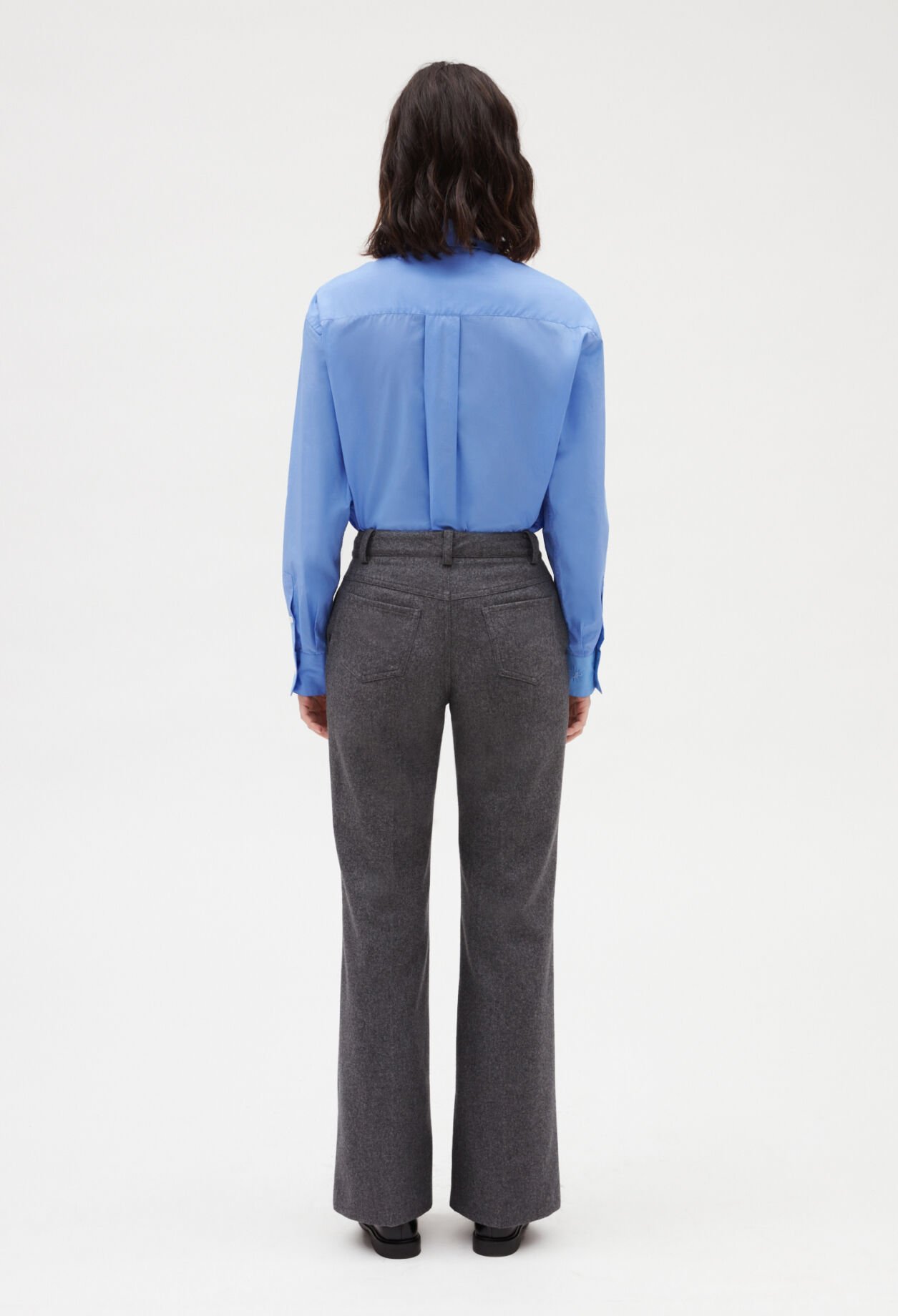 Pantalón acampanado gris jaspeado
