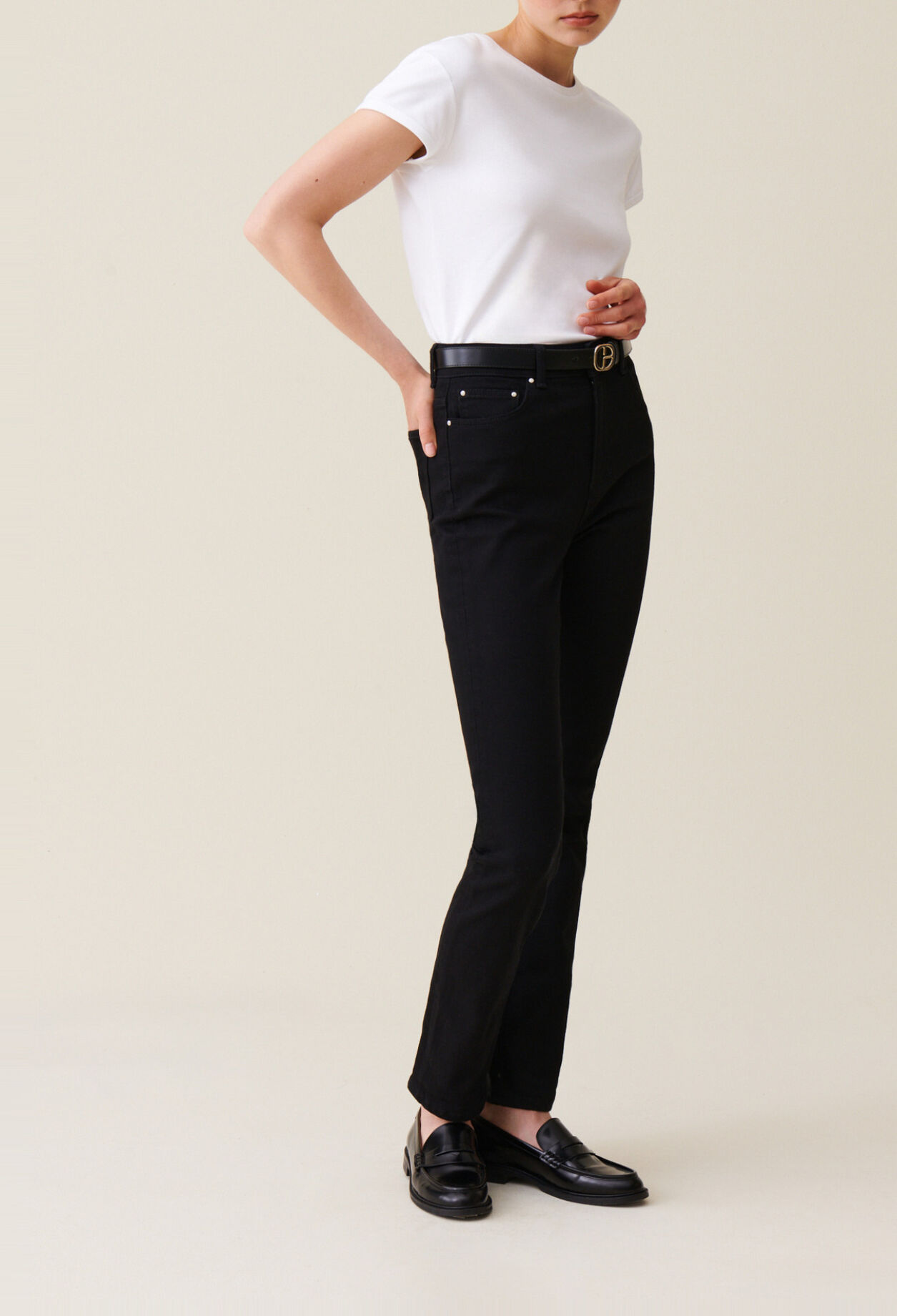 Vaqueros slim negros de tiro medio