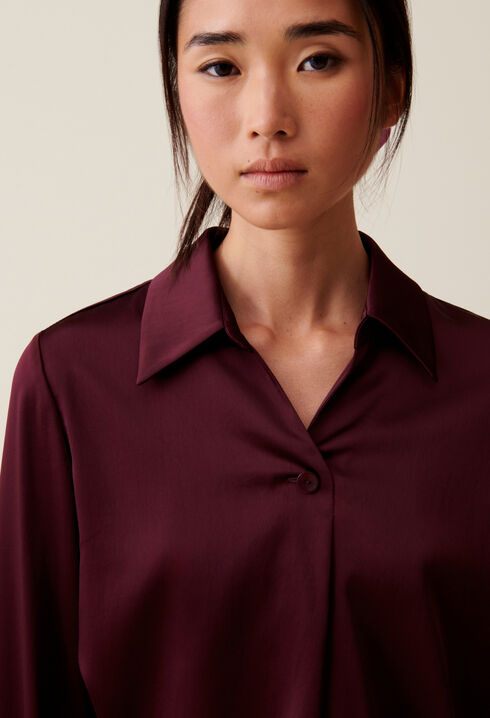 Blusa fluida cuello abierto