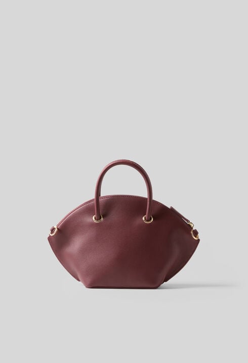 Bolso piel lisa con aros dorados