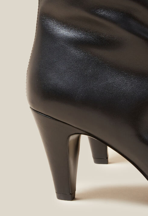 Botas altas de piel