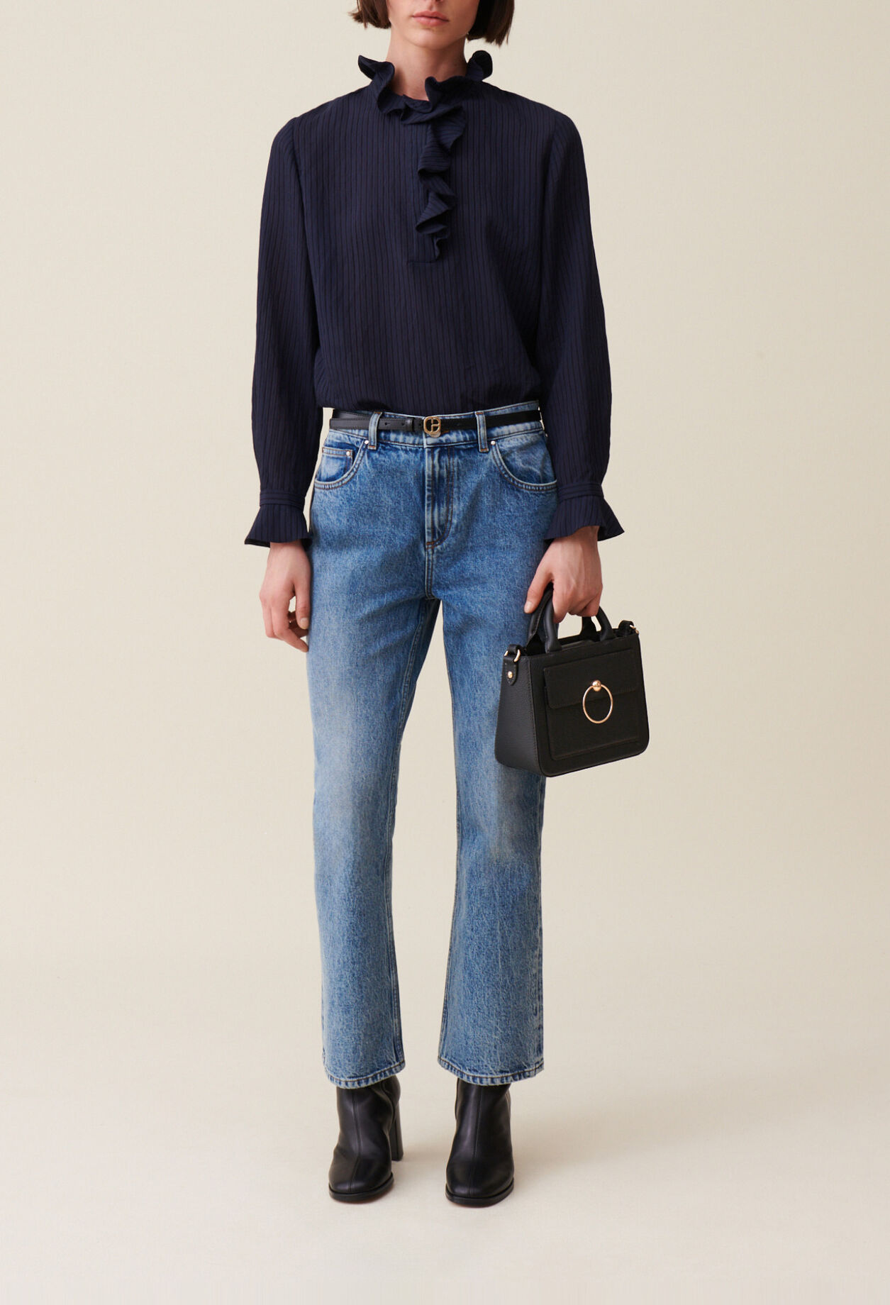 Blusa de rayas volantes azul oscuro