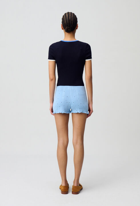 Short de punto fino.