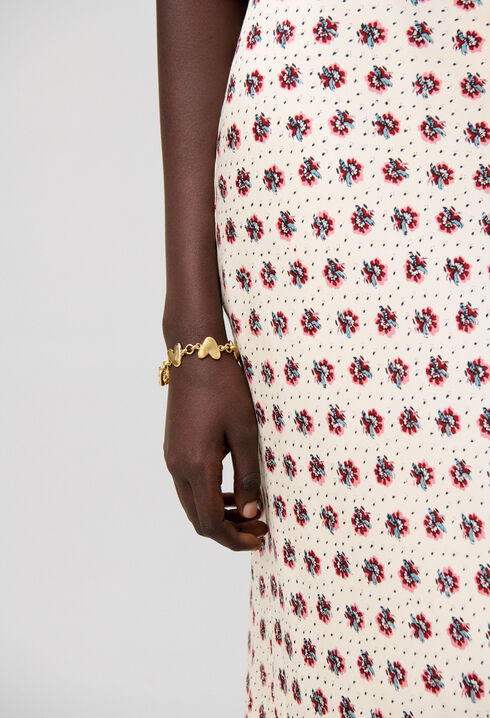 Pulsera con corazones martillados