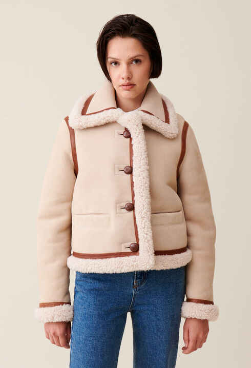 Chaqueta de piel lanosa beige