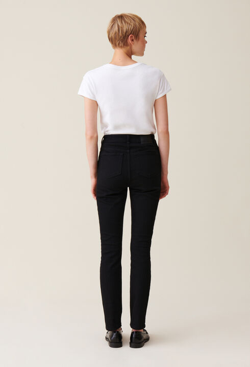 Vaqueros slim negros de tiro medio