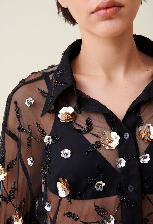 Blusa negra bordada transparente