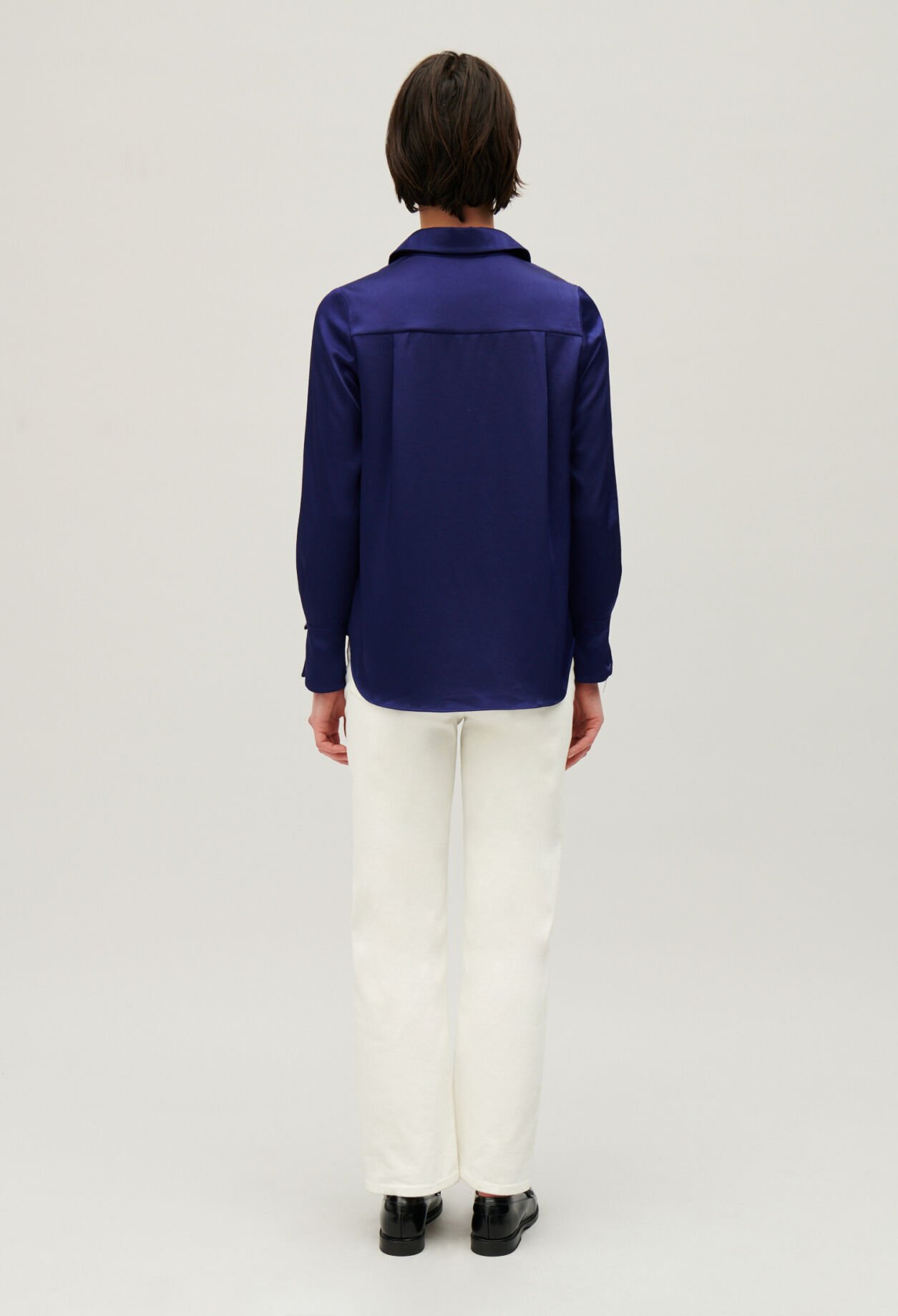 Blusa fluida plisada