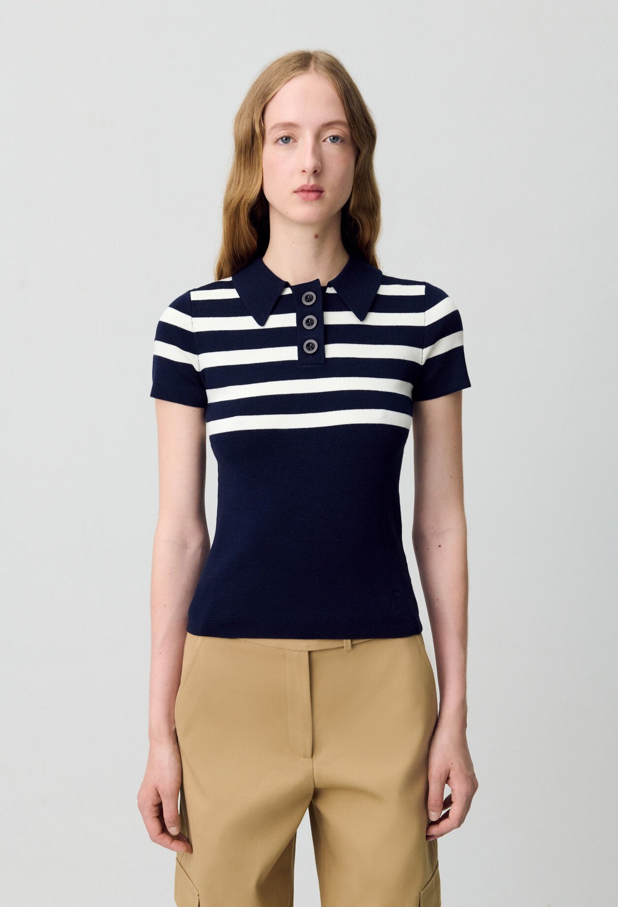 Polo de punto fino superior