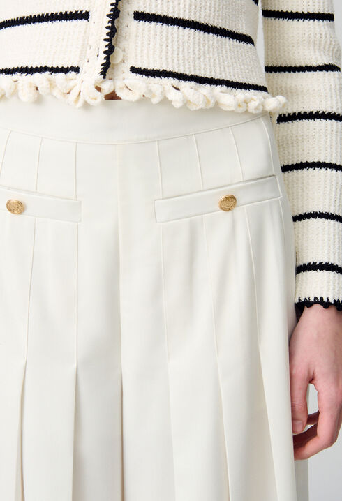 Pantalón amplio con pliegues