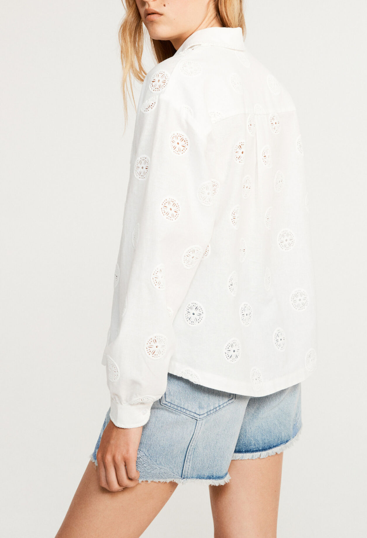 Blusa de manga larga y cuello polo