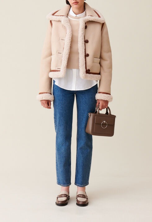 Chaqueta de piel lanosa beige