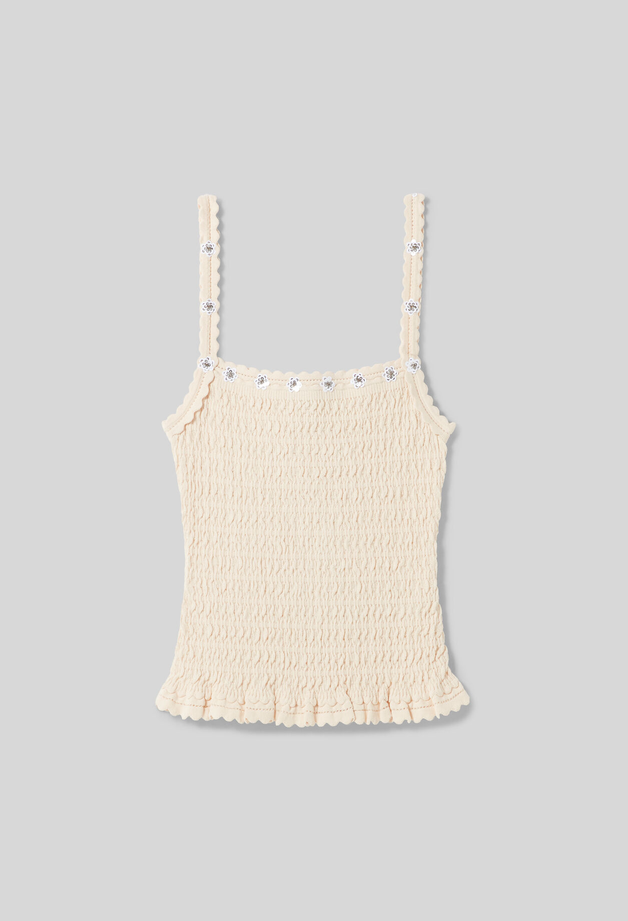 Top con bordados de flores