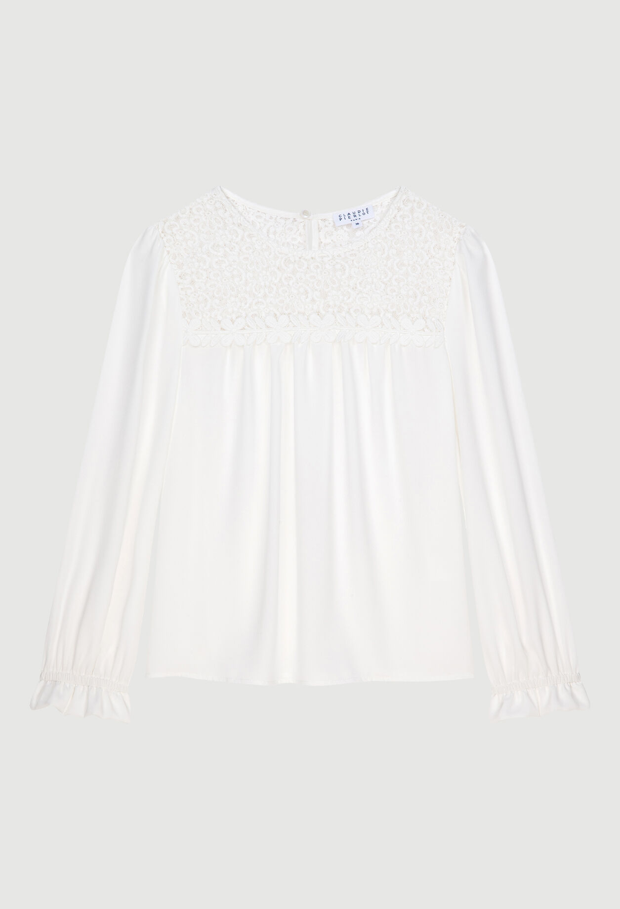 Blusa con detalles de guipur.
