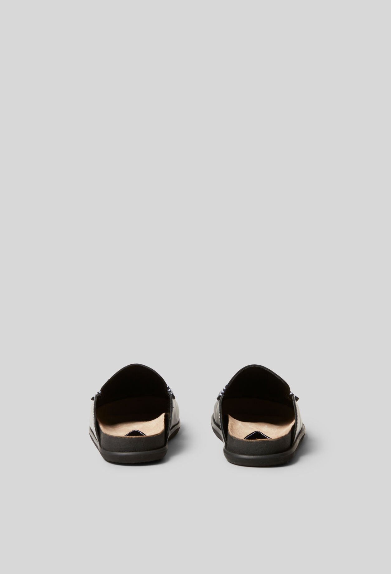 Mules de cuero liso