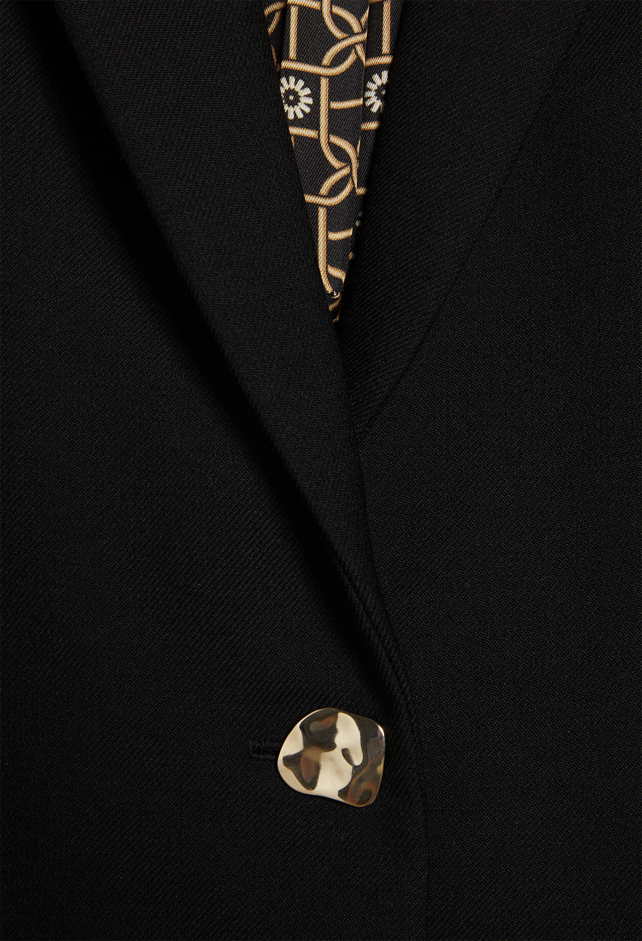 Blazer y poliéster reciclado