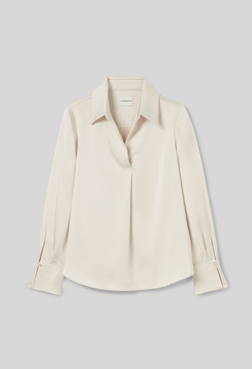 Blusa fluida plisada