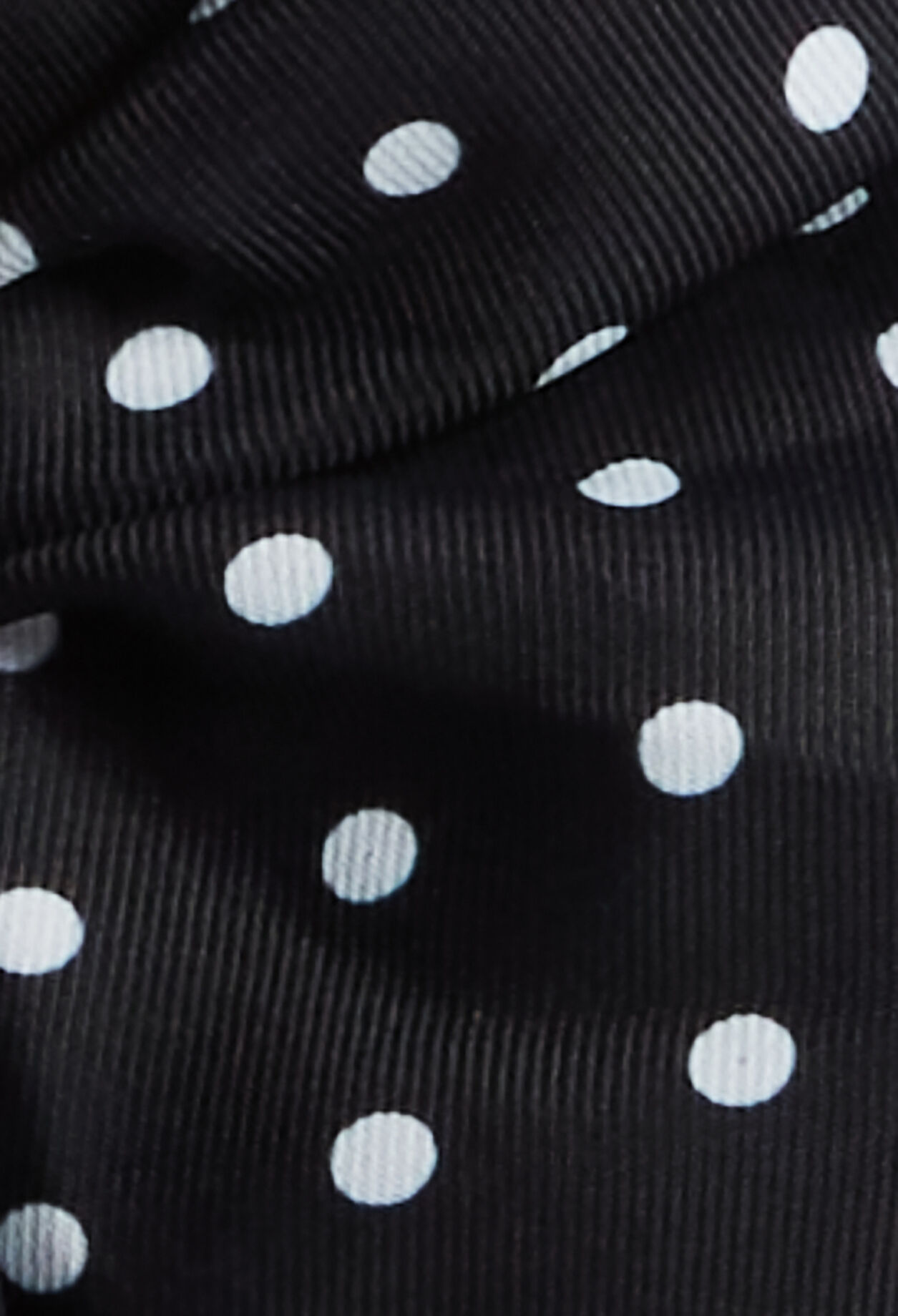 Coletero con estampado de lunares negros