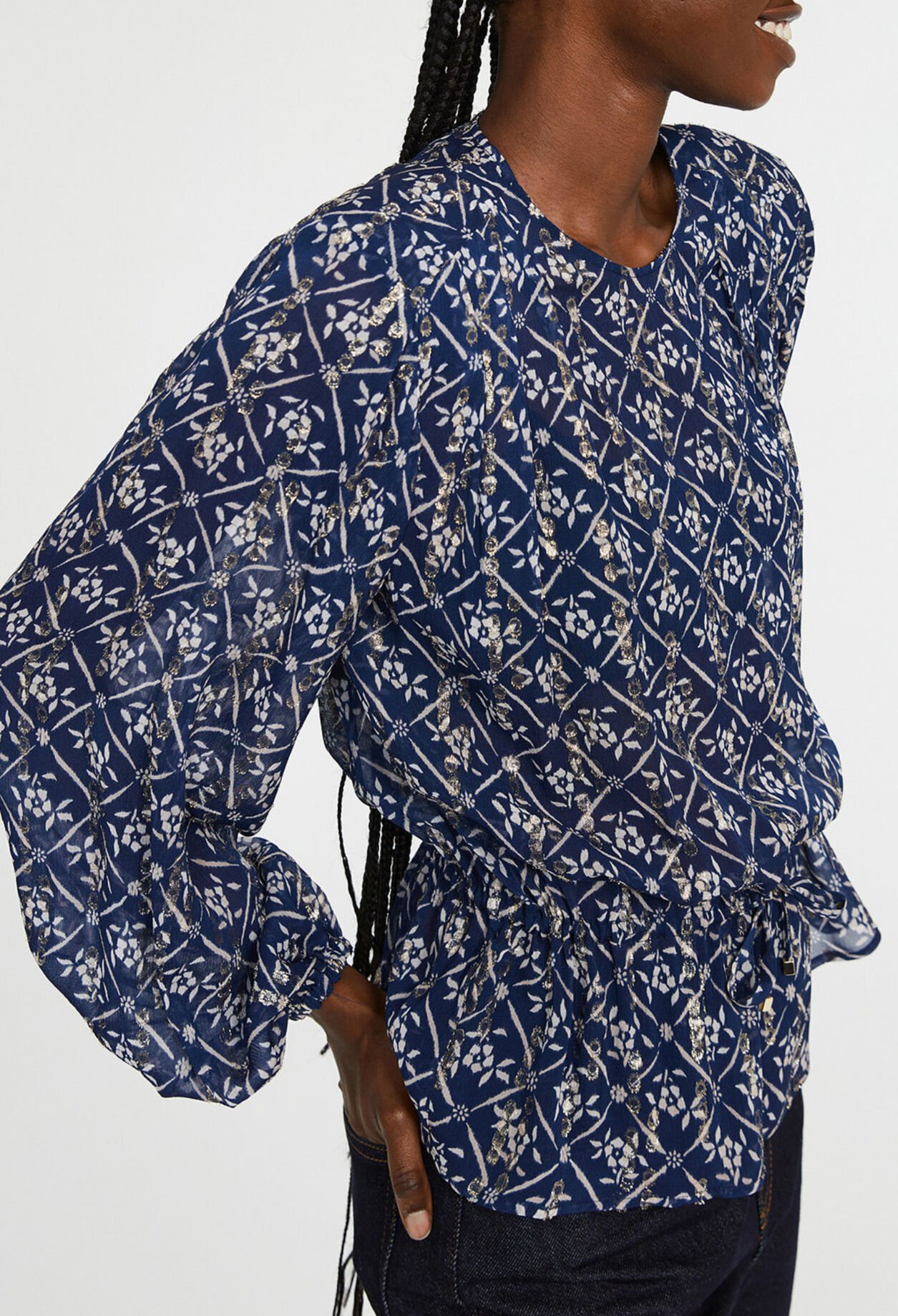 Blusa con motivos de flores