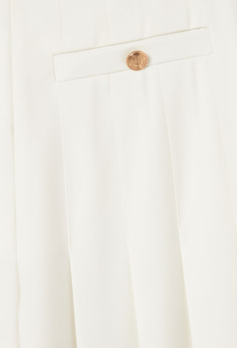 Pantalón amplio con pliegues