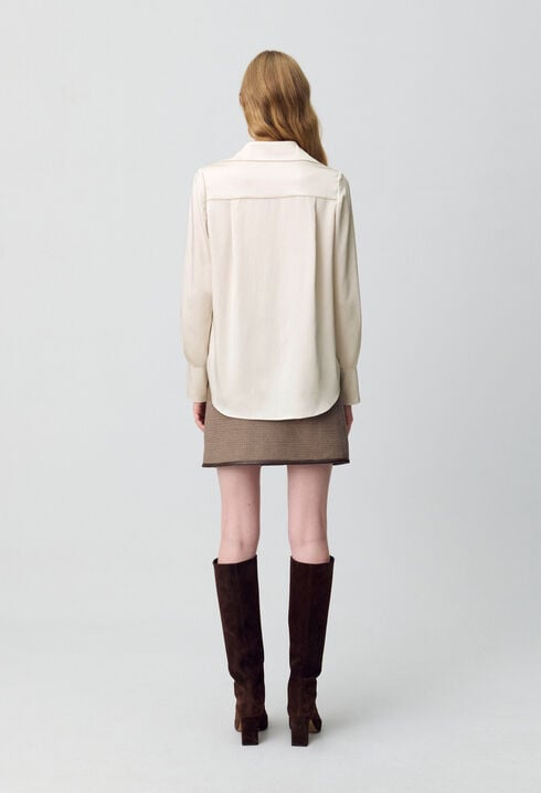 Blusa fluida plisada
