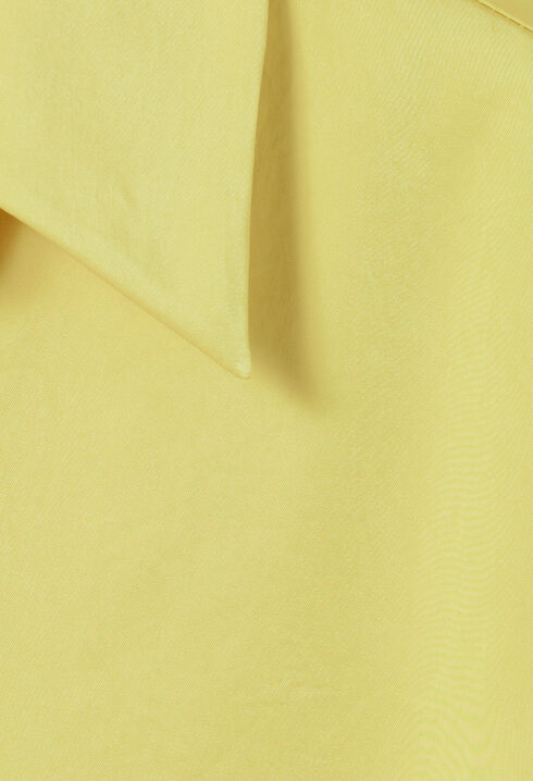 Blusa fluida cuello abierto