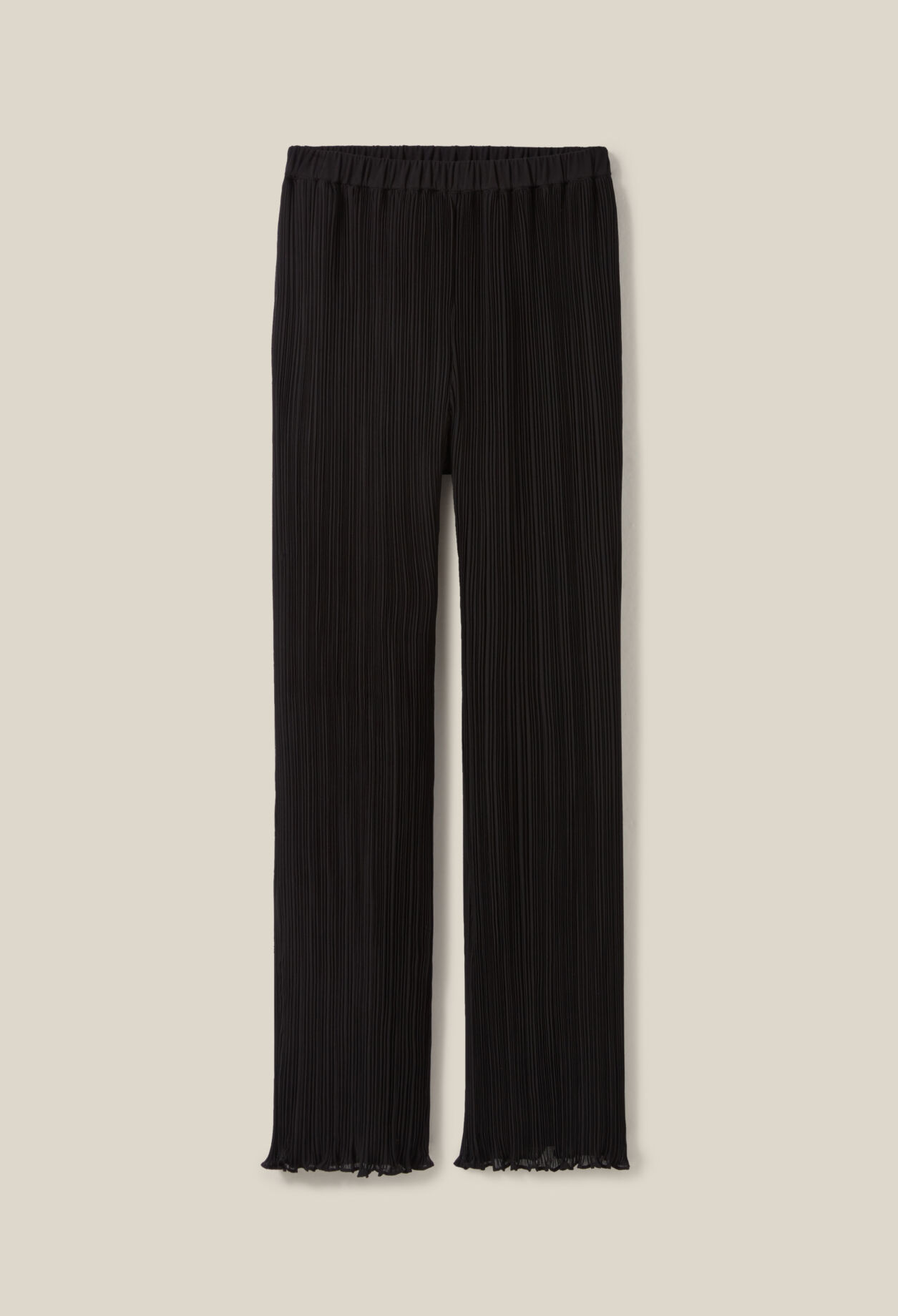Pantalón fluido con volantes