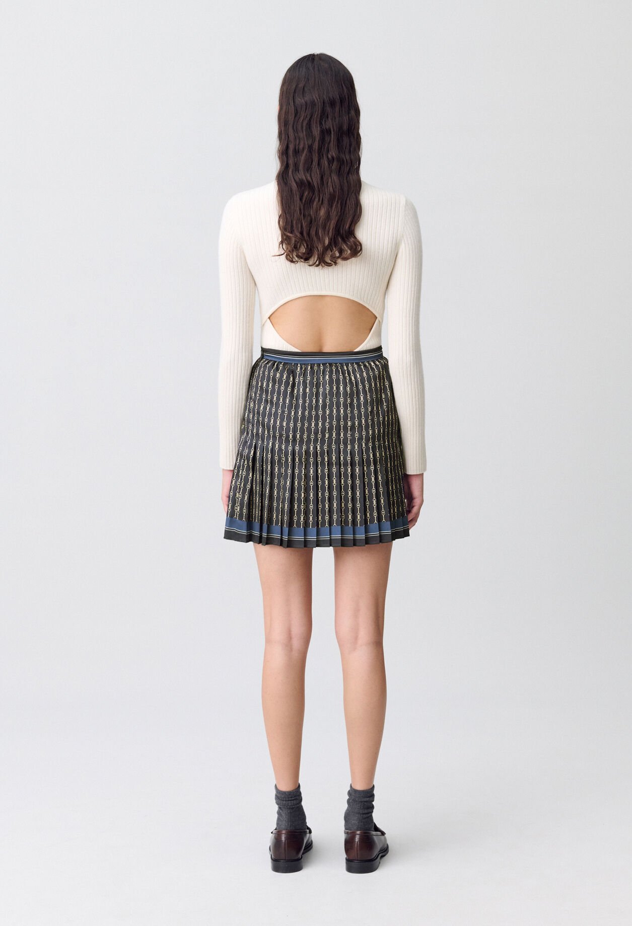 Falda corta plisada
