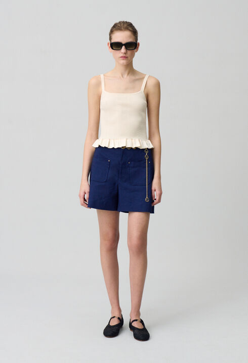 Top satinado con volantes