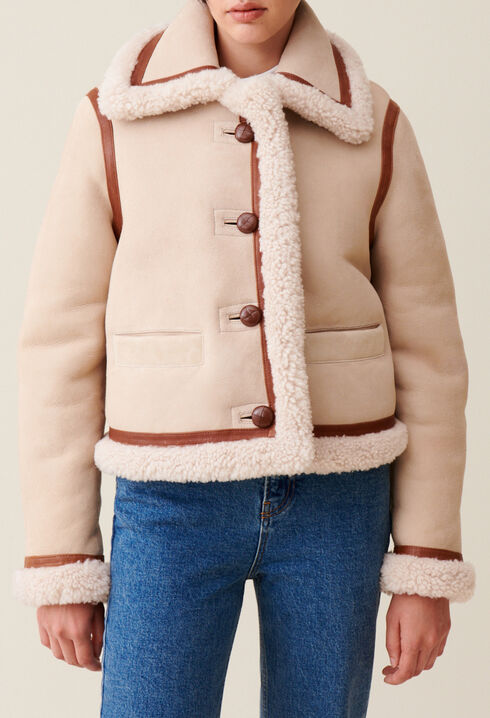 Chaqueta de piel lanosa beige