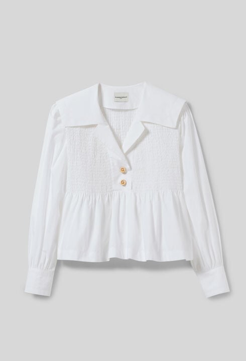 Blusa con volantes