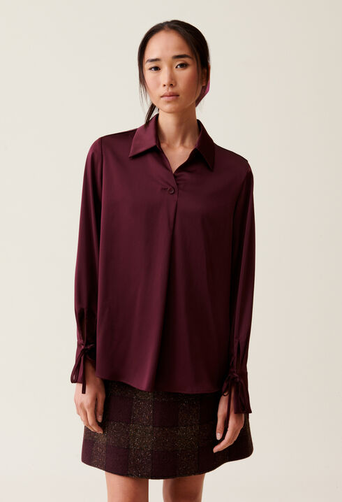 Blusa fluida cuello abierto