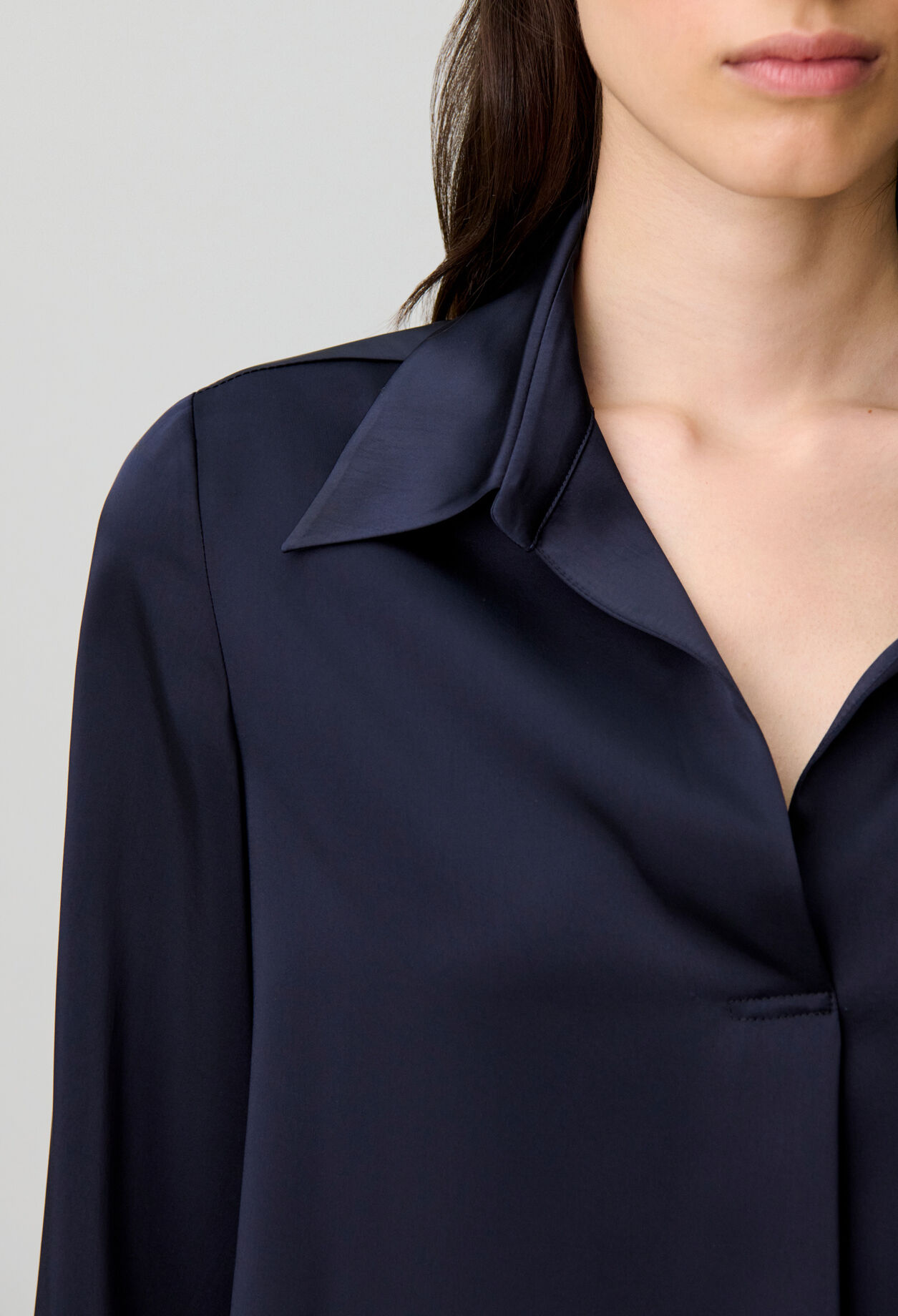 Blusa recta con pliegues