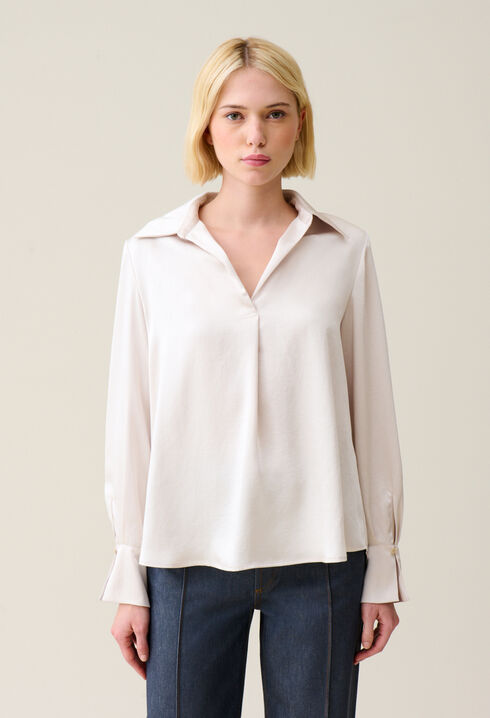 Blusa fluida plisada
