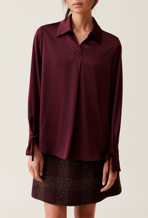 Blusa fluida cuello abierto