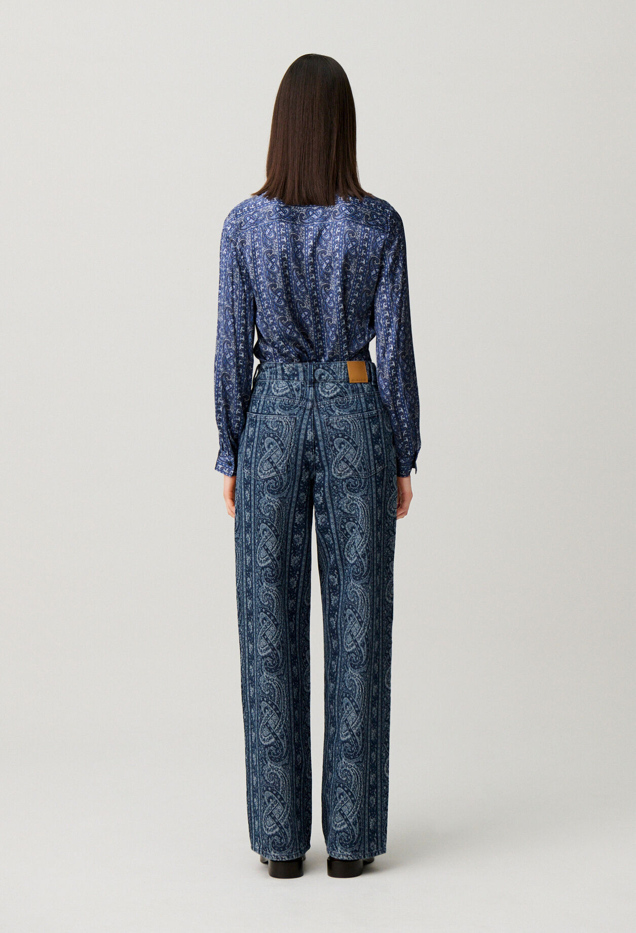 Vaquero recto denim estampado