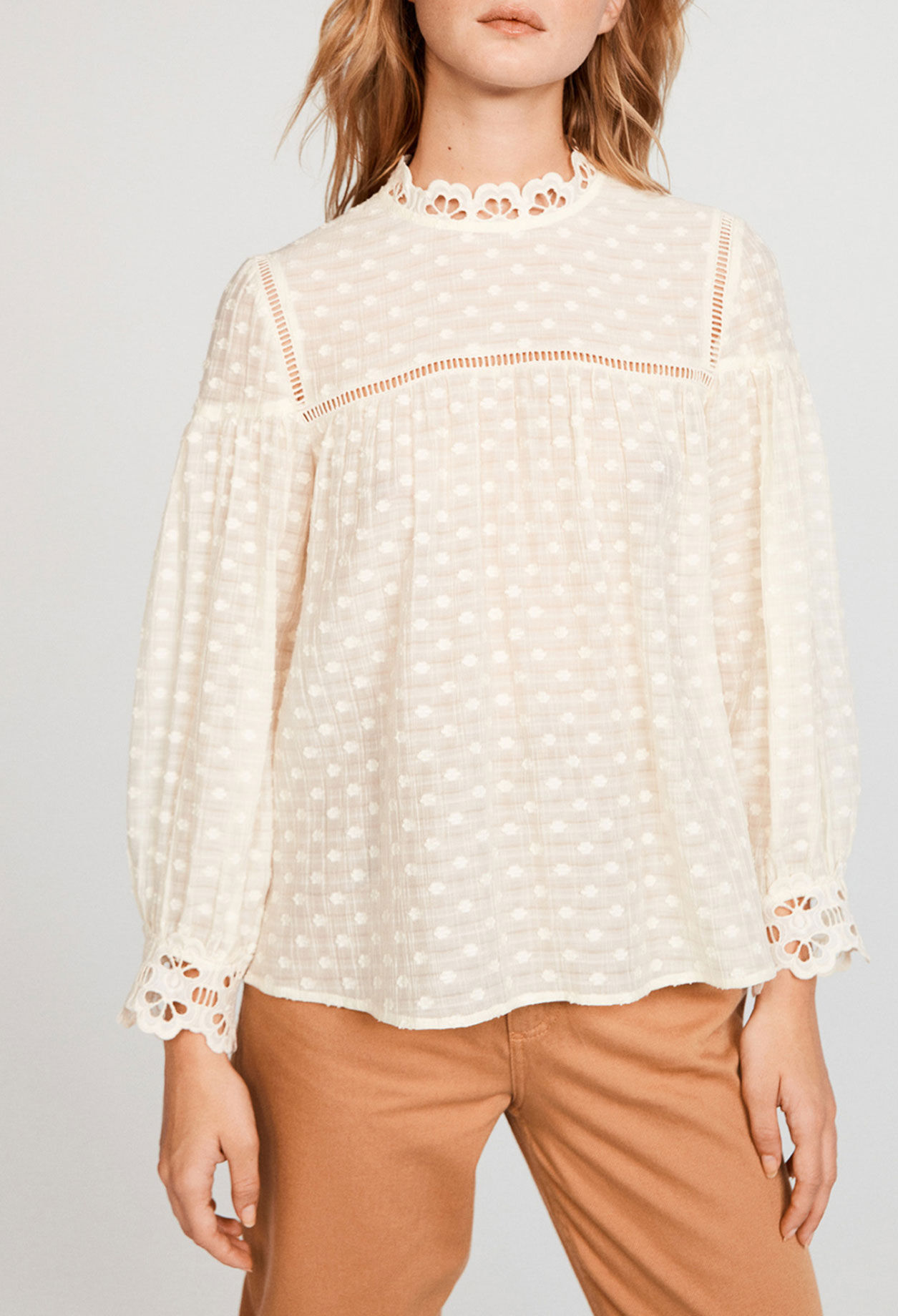 Blusa moteada