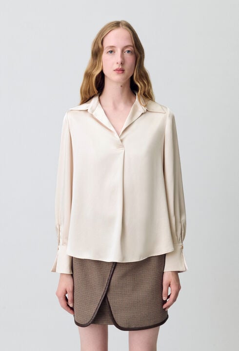 Blusa fluida plisada