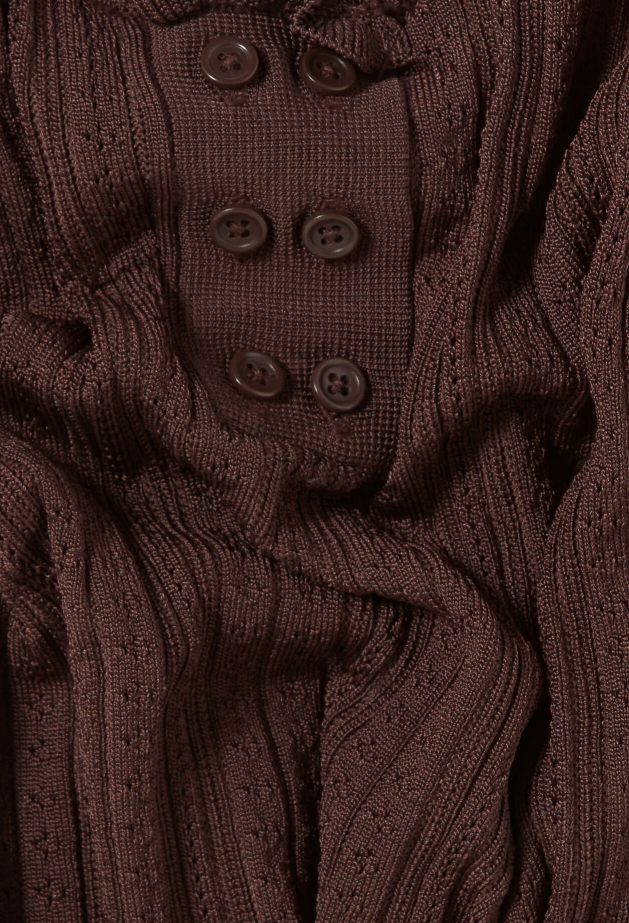 Top de punto calado con volante